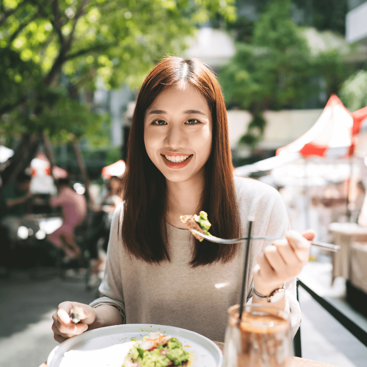 Maria S is seen enjoying a meal, having shared a remarkable testimonial about her experience with Moon Investments.