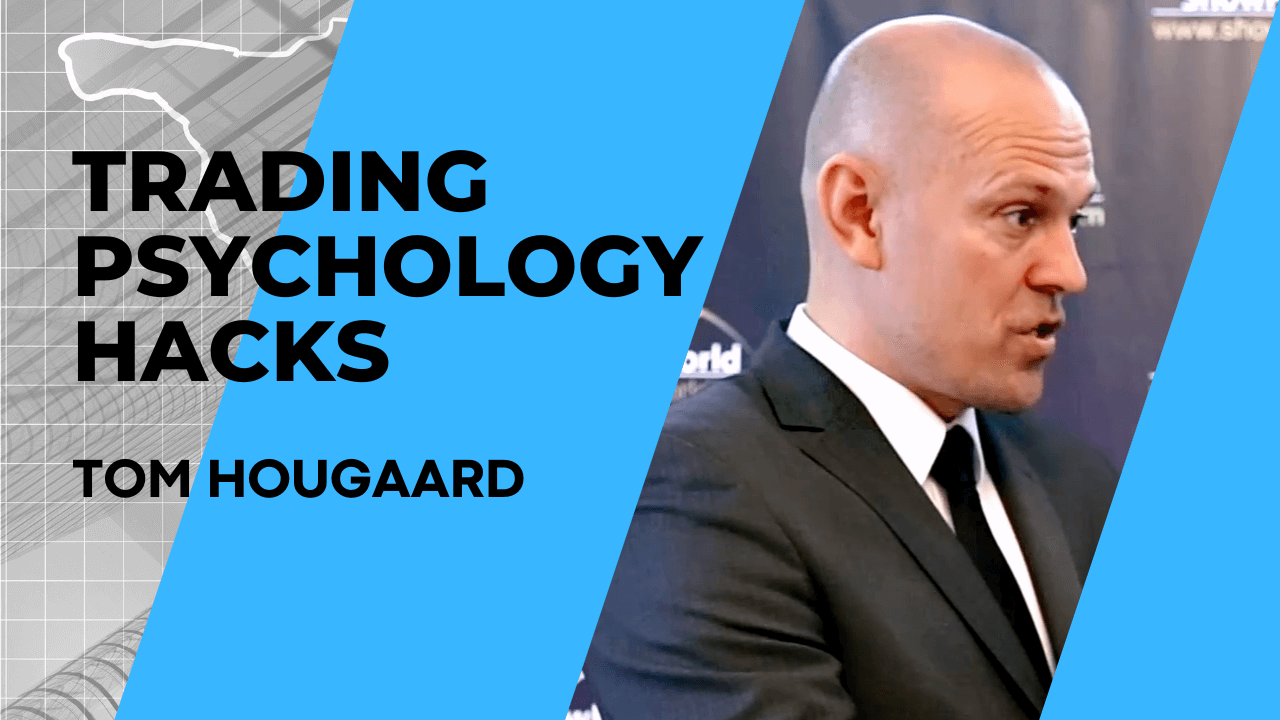 Man in suit discussing trading psychology hacks.